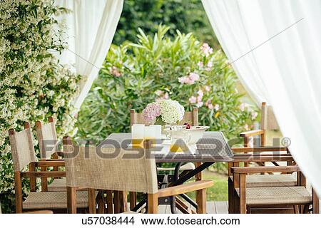 Picture - Garden table setting. Fotosearch