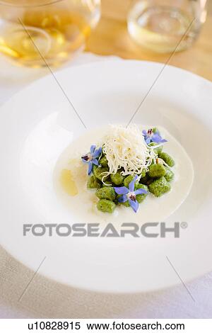 Herb gnocchi with wild flowers View Large Photo Image Stock Photography - Herb gnocchi with wild flowers. Fotosearch