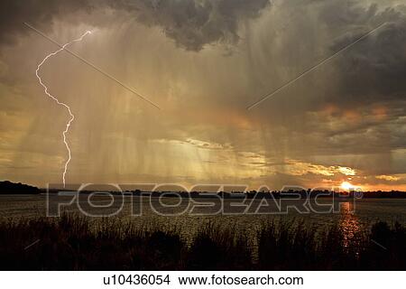 "Lightning storm over lake, Simonga, Livingstone, Zambia" View Large Photo Image Picture - "Lightning storm over lake, Simonga, Livingstone, Zambia". Fotosearch