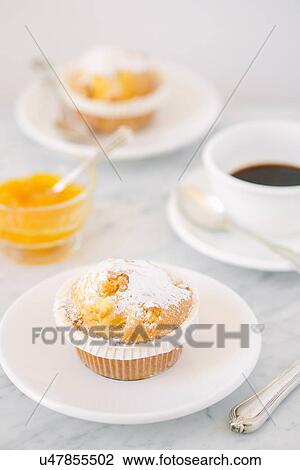 Muffin and coffee for two View Large Photo Image Stock Image - Muffin and coffee for two. Fotosearch