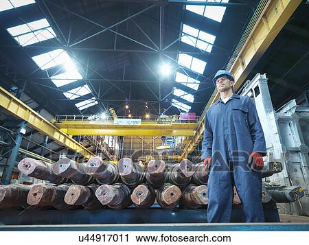 Portrait of engineer in engineering factory View Large Photo Image Stock Image - Portrait of engineer in engineering factory. Fotosearch