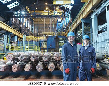 Stock Photo - Portrait of engineers in engineering factory. Fotosearch