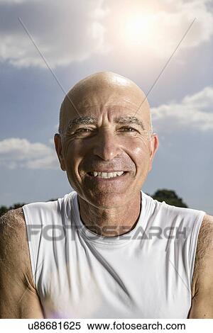 Portrait of happy sportsman View Large Photo Image Stock Photography - Portrait of happy sportsman. Fotosearch