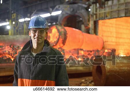 Portrait of steelworker apprentice in steelworks View Large Photo Image Stock Image - Portrait of steelworker apprentice in steelworks. Fotosearch