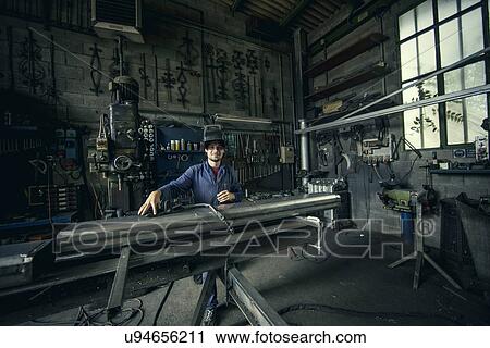 Portrait of welder in workshop View Large Photo Image Stock Image - Portrait of welder in workshop. Fotosearch