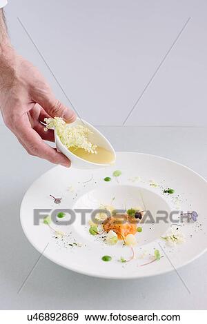 Stock Photo - "Ravioli, salmon and elderflower sauce". Fotosearch