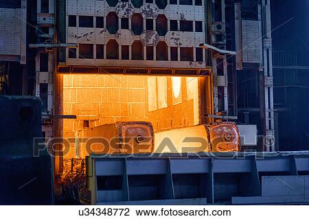 Red hot steel in steelworks furnace View Large Photo Image Stock Image - Red hot steel in steelworks furnace. Fotosearch