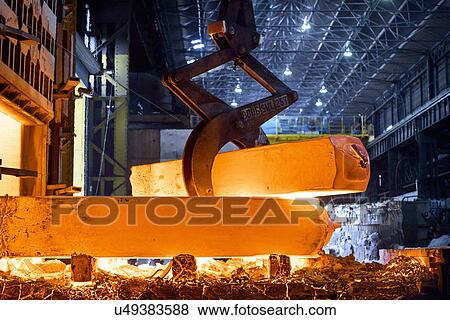 Stock Photo - Red hot steel in steelworks. Fotosearch