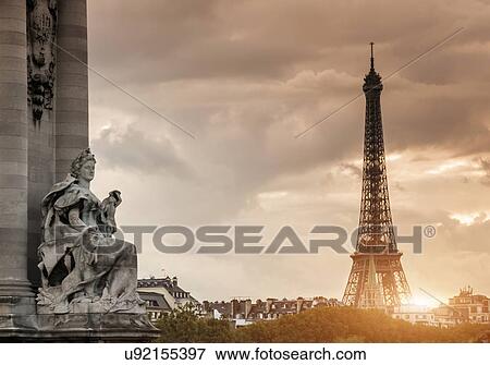 "Sculpture on Pont Alexandre III bridge and Eiffel Tower, Paris, France" View Large Photo Image Stock Photo - "Sculpture on Pont Alexandre III bridge and Eiffel Tower, Paris, France". Fotosearch