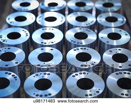 Stock Image - Steel parts on production line in factory. Fotosearch