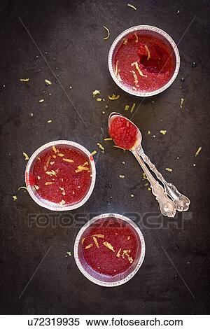 Stock Photography - Strawberry pudding with lemon peel. Fotosearch