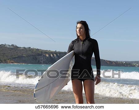 Stock Photograph - "Surfer enjoying beach, Roadknight, Victoria, Australia". Fotosearch