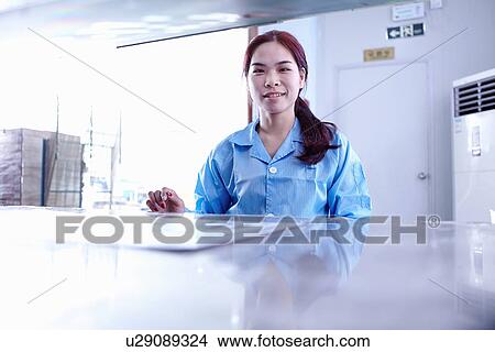 Technician working in LED factory View Large Photo Image Picture - Technician working in LED factory. Fotosearch