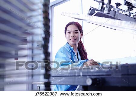 Technician working in LED factory View Large Photo Image Stock Photo - Technician working in LED factory. Fotosearch