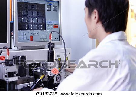 Technician working in LED factory View Large Photo Image Stock Photography - Technician working in LED factory. Fotosearch