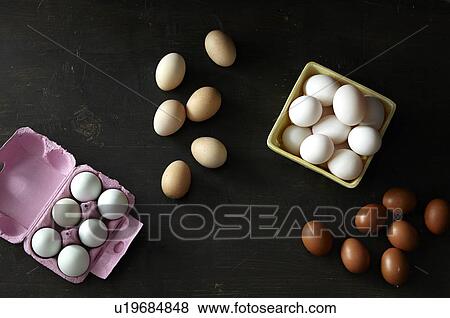 Variety of chicken eggs View Large Photo Image Stock Photo - Variety of chicken eggs. Fotosearch