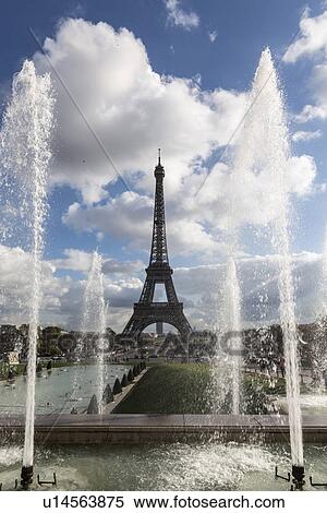 Stock Photography - "View of park fountains and Eiffel Tower, Paris, France". Fotosearch