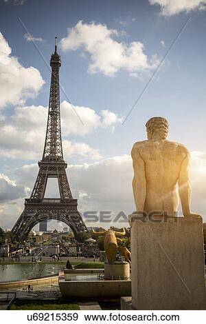 "View of sculpture in front of Eiffel Tower, Paris, France" View Large Photo Image Stock Photo - "View of sculpture in front of Eiffel Tower, Paris, France". Fotosearch