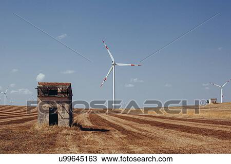 "Windmills on farm, Italy" View Large Photo Image Stock Image - "Windmills on farm, Italy". Fotosearch