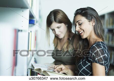 Women studying in the library View Large Photo Image Stock Photo - Women studying in the library. Fotosearch