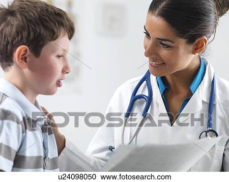 Stock Image - Paediatric examination. Fotosearch