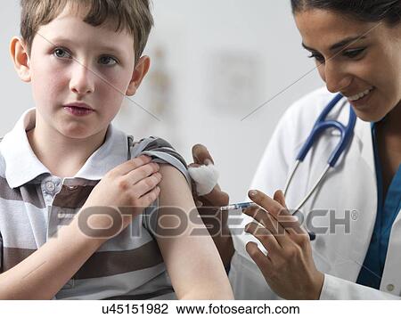 Stock Image - Paediatric examination. Fotosearch