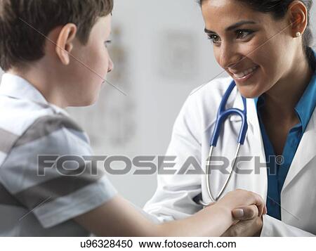 Stock Image - Paediatric examination. Fotosearch