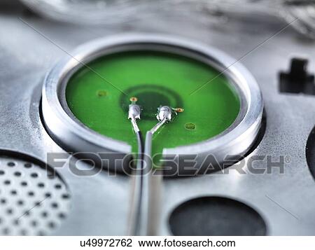 Drawing - Rear of a power button. Fotosearch