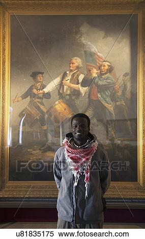 "African visits Abbot Hall to see ""Spirit of 76"" Painting by Archibald Willard, Marblehead, Massachusetts, USA" View Large Photo Image Stock Photography - "African visits Abbot Hall to see ""Spirit of 76"" Painting by Archibald Willard, Marblehead, Massachusetts, USA". Fotosearch
