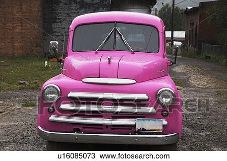 Stock Image - "Antique purple truck in rain, Silverton, Colorado, USA". Fotosearch