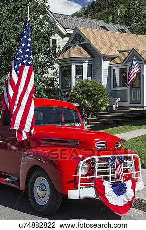 "Antique Red Truck and US Flag, July 4, Independence Day Parade, Telluride, Colorado, USA" View Large Photo Image Stock Image - "Antique Red Truck and US Flag, July 4, Independence Day Parade, Telluride, Colorado, USA". Fotosearch