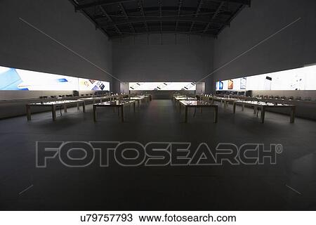 Stock Image - "Apple Store at night midtown New York City, Broadway, New York, USA". Fotosearch