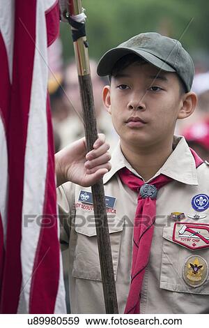 "Asian boyscout display US Flag at solemn 2014 Memorial Day Event, Los Angeles National Cemetery, California, USA" View Large Photo Image Stock Photo - "Asian boyscout display US Flag at solemn 2014 Memorial Day Event, Los Angeles National Cemetery, California, USA". Fotosearch