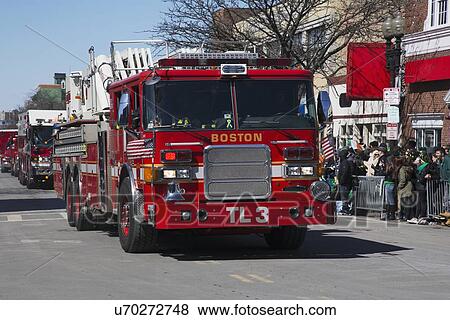 Stock Photo - "Boston firetruck, St. Patrick's Day Parade, 2014, South Boston, Massachusetts, USA". Fotosearch
