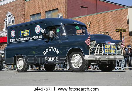 Stock Image - "Boston Strong, Police, St. Patrick's Day Parade, 2014, South Boston, Massachusetts, USA". Fotosearch