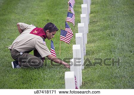 "Boyscout places one of 85, 000 US Flags at 2014 Memorial Day Event, Los Angeles National Cemetery, California, USA" View Large Photo Image Stock Image - "Boyscout places one of 85, 000 US Flags at 2014 Memorial Day Event, Los Angeles National Cemetery, California, USA". Fotosearch