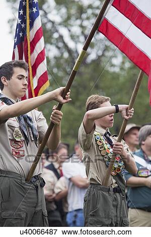Stock Photo - "Boyscouts display US Flag at solemn 2014 Memorial Day Event, Los Angeles National Cemetery, California, USA". Fotosearch