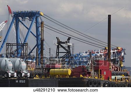 "Brightly colored port loading equipment, New York and New Jersey Port Authority, New Jersey, USA" View Large Photo Image Stock Image - "Brightly colored port loading equipment, New York and New Jersey Port Authority, New Jersey, USA". Fotosearch