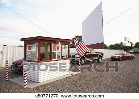 "Cars in line buying tickets to Star Drive In Movie Theater, Montrose, Colorado, USA" View Large Photo Image Stock Image - "Cars in line buying tickets to Star Drive In Movie Theater, Montrose, Colorado, USA". Fotosearch