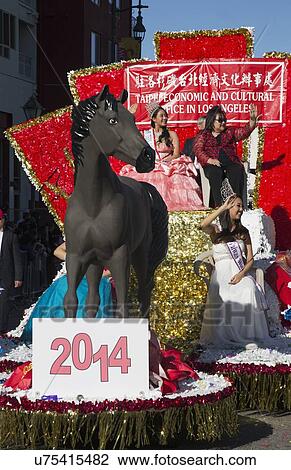 Stock Image - "Chairperson K? ng Ch? ng-Chéng of Taipei, Taiwan, 115th Golden Dragon Parade, Chinese New Year, 2014, Year of the Horse, Los Angeles, California, USA". Fotosearch