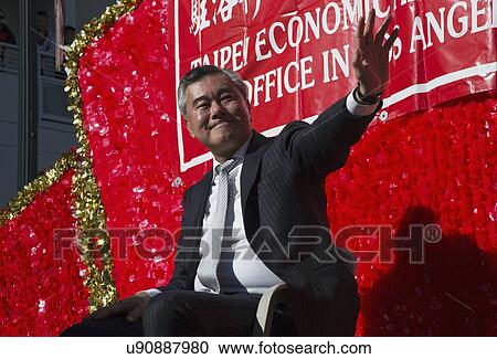 Stock Image - "Chairperson K? ng Ch? ng-Chéng of Taipei, Taiwan, 115th Golden Dragon Parade, Chinese New Year, 2014, Year of the Horse, Los Angeles, California, USA". Fotosearch