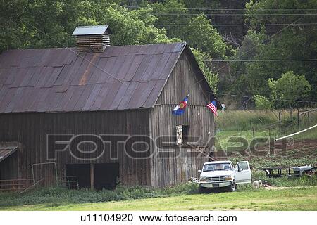 "Colorado and US Flag hang on barn with white pickup truck, Colorado, USA" View Large Photo Image Stock Image - "Colorado and US Flag hang on barn with white pickup truck, Colorado, USA". Fotosearch