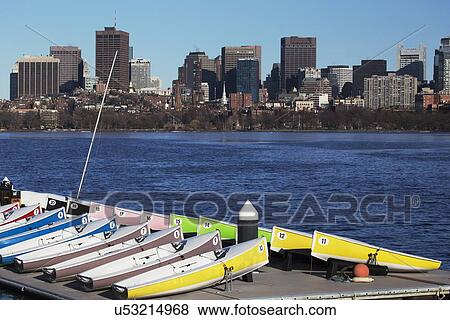 Stock Photo - "Colorful docked sailboats and Boston Skyline, Charles River, Massachusetts, USA". Fotosearch
