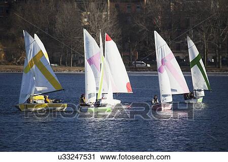 "Colorful sailboats and Boston Skyline in winter on Charles River, Massachusetts, USA" View Large Photo Image Stock Image - "Colorful sailboats and Boston Skyline in winter on Charles River, Massachusetts, USA". Fotosearch