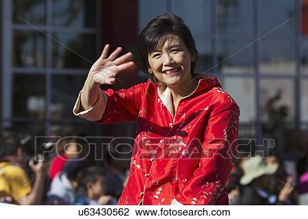 Stock Image - "Congresswoman Judy Chew, 115th Golden Dragon Parade, Chinese New Year, 2014, Year of the Horse, Los Angeles, California, USA". Fotosearch