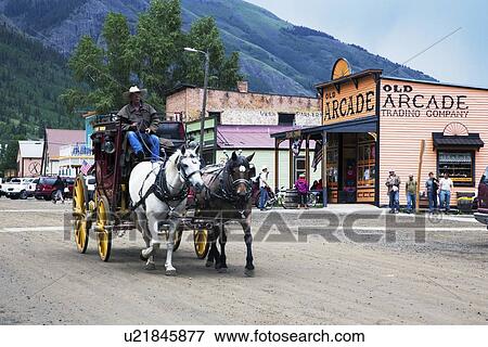 "Covered wagon and horses, Silverton, Colorado, USA" View Large Photo Image Stock Photo - "Covered wagon and horses, Silverton, Colorado, USA". Fotosearch