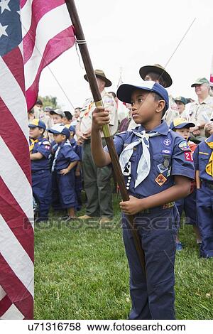 "Cubscout display US Flag at solemn 2014 Memorial Day Event, Los Angeles National Cemetery, California, USA" View Large Photo Image Stock Photo - "Cubscout display US Flag at solemn 2014 Memorial Day Event, Los Angeles National Cemetery, California, USA". Fotosearch