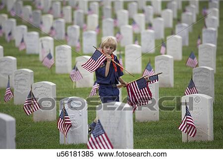 "Cubscout places one of 85, 000 US Flags at 2014 Memorial Day Event, Los Angeles National Cemetery, California, USA" View Large Photo Image Stock Photography - "Cubscout places one of 85, 000 US Flags at 2014 Memorial Day Event, Los Angeles National Cemetery, California, USA". Fotosearch