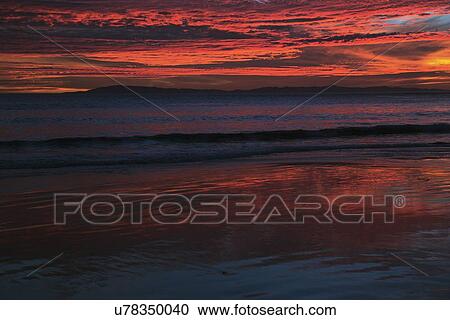 "Deep purple and orange sunset looking towards Anacapa Island, Ventura, California, USA" View Large Photo Image Stock Image - "Deep purple and orange sunset looking towards Anacapa Island, Ventura, California, USA". Fotosearch