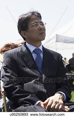 Stock Image - "Diplomat attending Los Angeles National Cemetery Annual Memorial Event, May 26, 2014, California, USA". Fotosearch